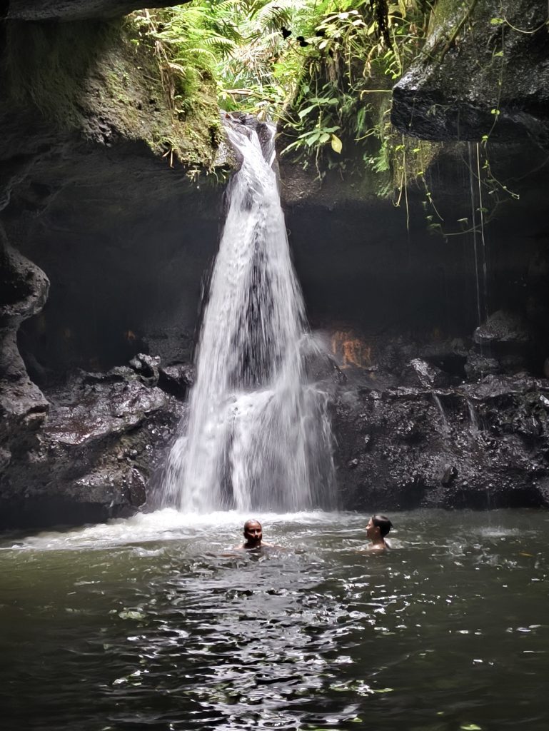 Guests swimming at Sarang Walet Waterfall in Tetebatu Lombok